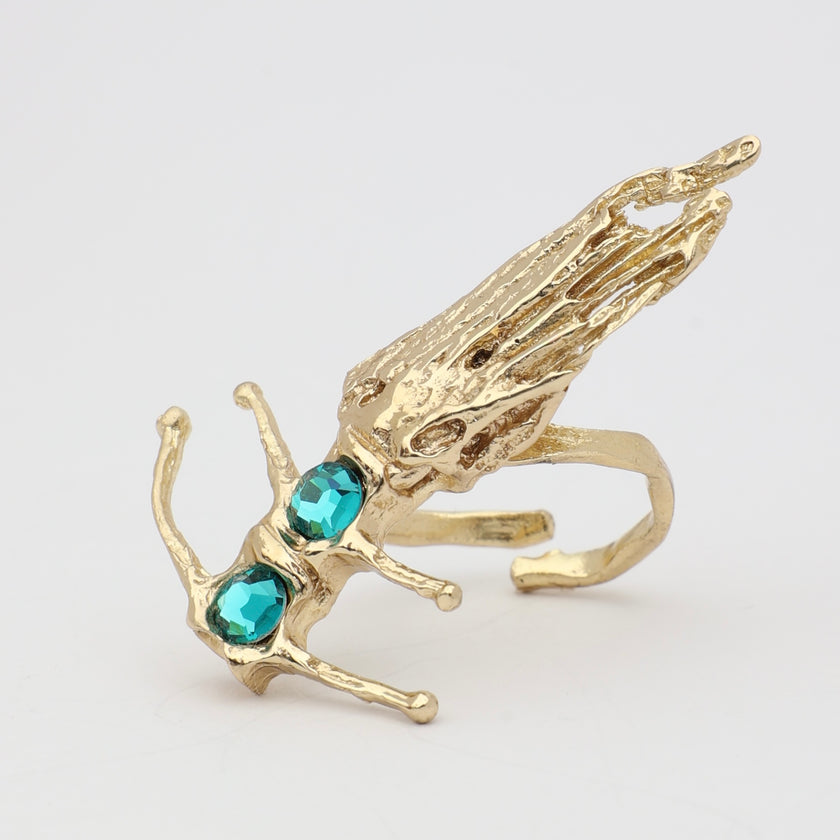 Draco Ring side view — handmade brass statement ring with fin detail and faceted crystal accent