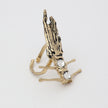 Draco Ring — handmade brass sculptural dragonfish ring with crystal stones on white background