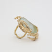 Crabby Ring detail — handmade brass ring with open adjustable band and textured creature legs