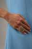 Crabby Ring flat lay — handmade brass sculptural ring with crab body form and large resin stone accent