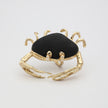 Claw Crabby Ring — handmade brass statement ring shaped as full crab with domed resin stone shell on white background