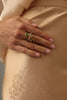 Coralia Ring on model — handmade brass statement ring worn on finger showing scale of sculptural underwater scene