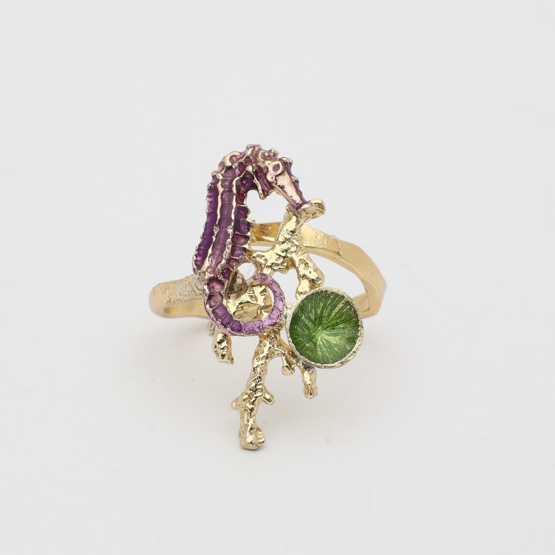 Single Coralia Ring — handmade brass statement ring with crystal seahorse and coral branch on white background