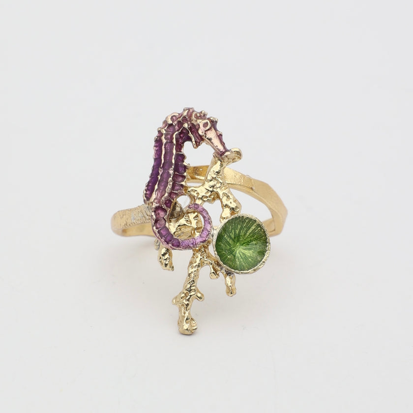Single Coralia Ring — handmade brass statement ring with crystal seahorse and coral branch on white background