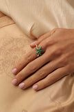 Astel Ring detail — handmade brass ring with open adjustable band and pitted textured surface finish