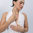 Brass branch ring worn with matching necklace and bracelet