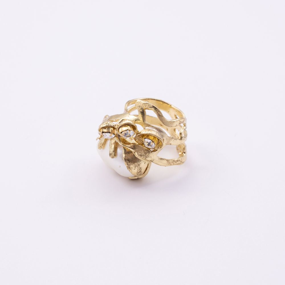 Brass open-band ring with baroque pearl and crystal detail, top view