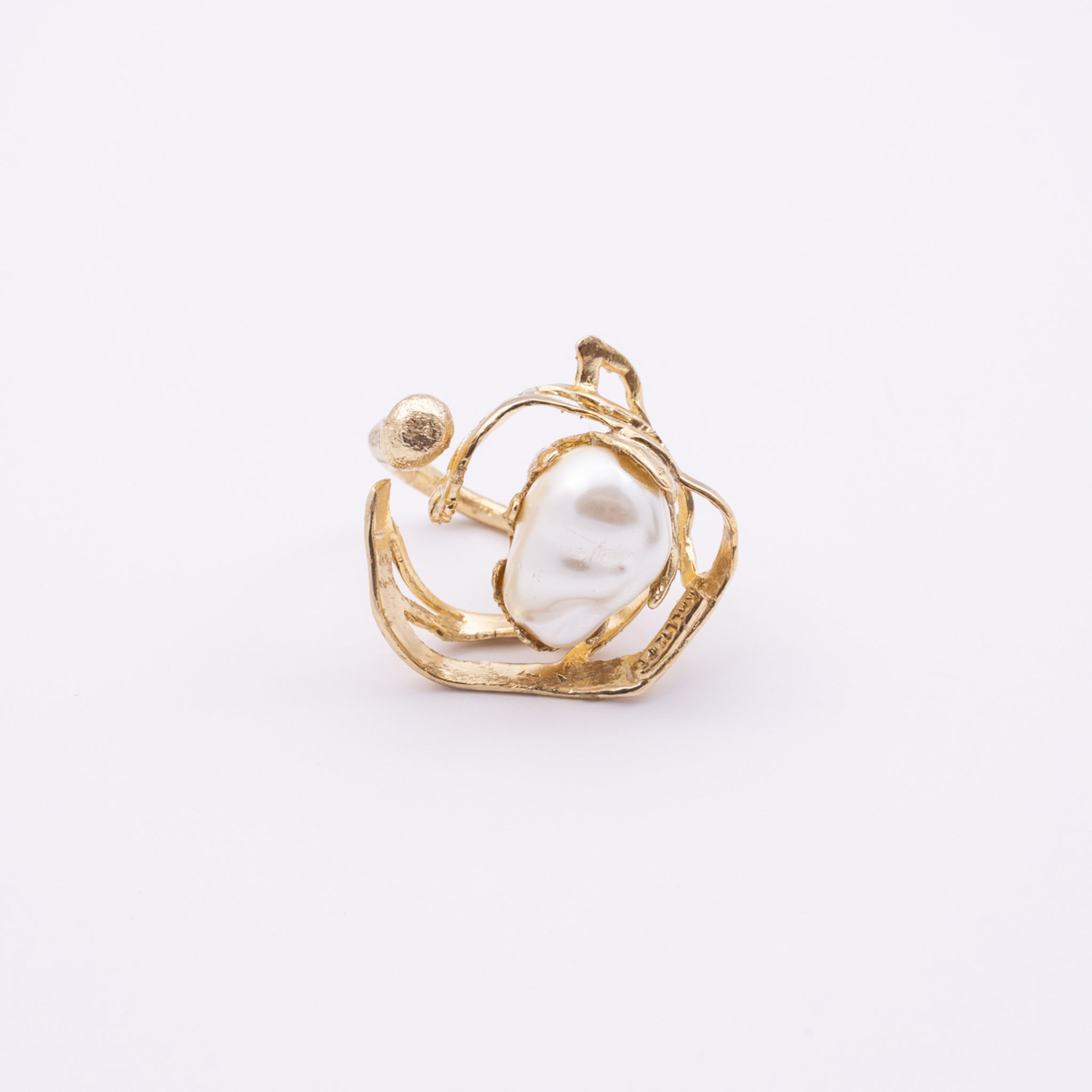 Open-back brass ring with sculptural pearl nest design, product shot, Bubblegum