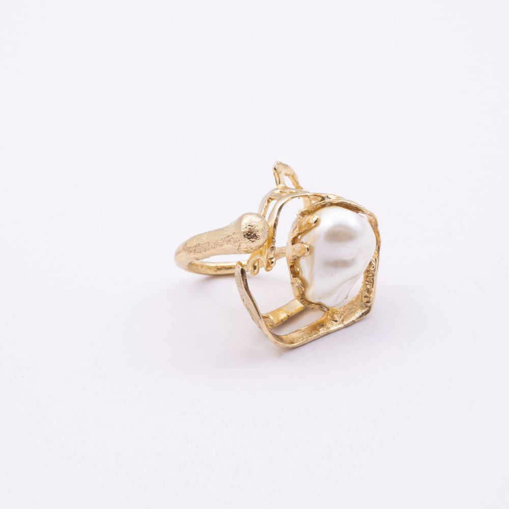Brass statement ring with baroque pearl setting, side view, Bubblegum