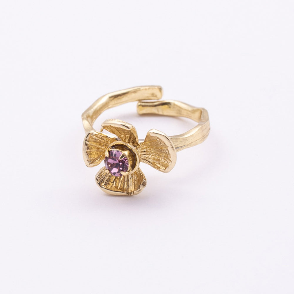 Posy Ring side view — handmade brass floral ring with open adjustable band and raised petal detail