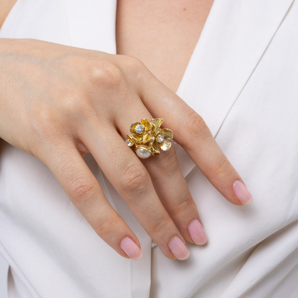 Rosebud Ring — handmade brass floral cluster ring with pearl and crystal stones on model