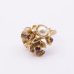 Rosebud Ring side view — handmade brass layered flower ring with pearl centerpiece and faceted stones