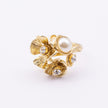 Rosebud Ring detail — handmade brass ring with textured petal layers and pearl and crystal setting whitebox