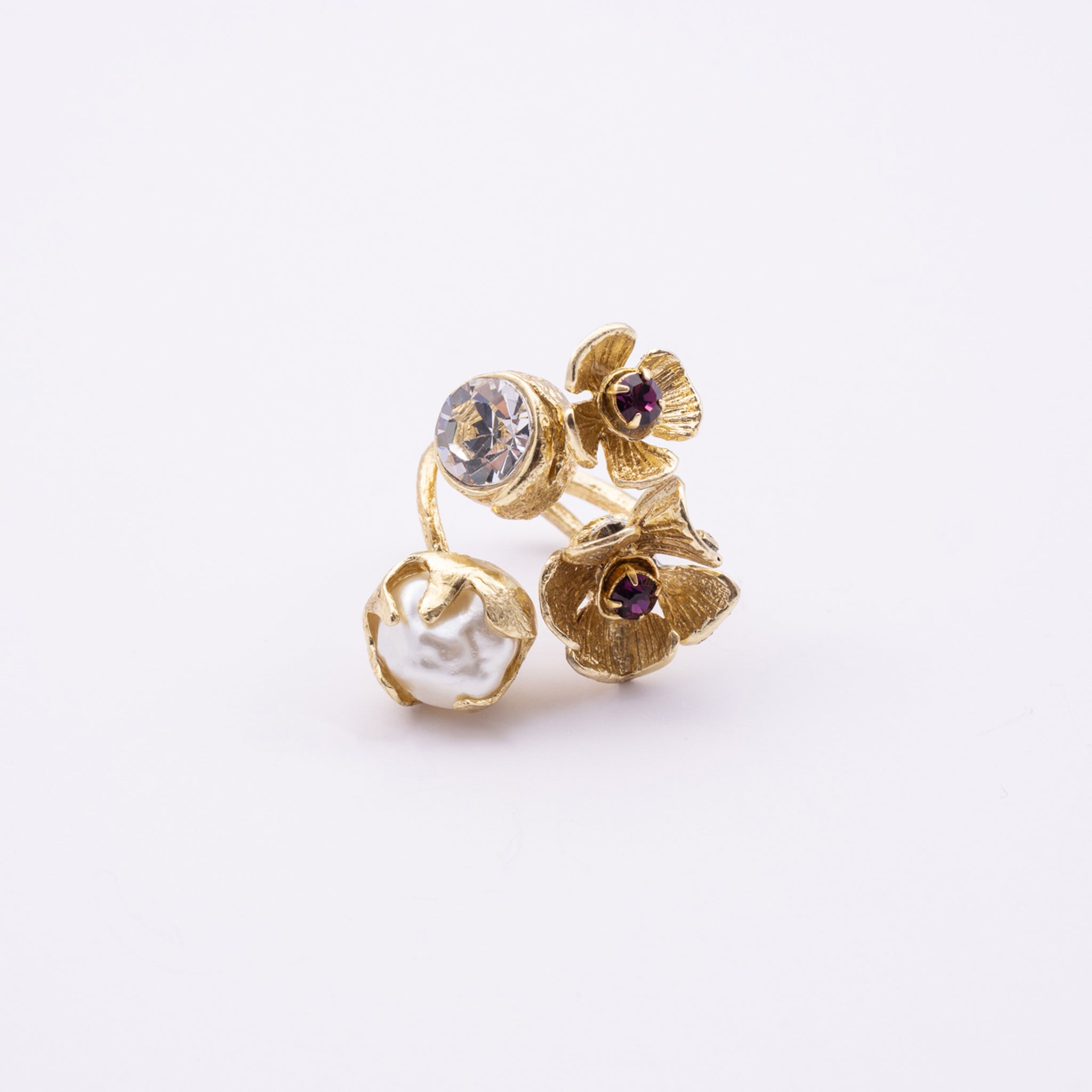Double Posy Ring — handmade brass floral ring with crystal stone, pearl, and flower detail on white background