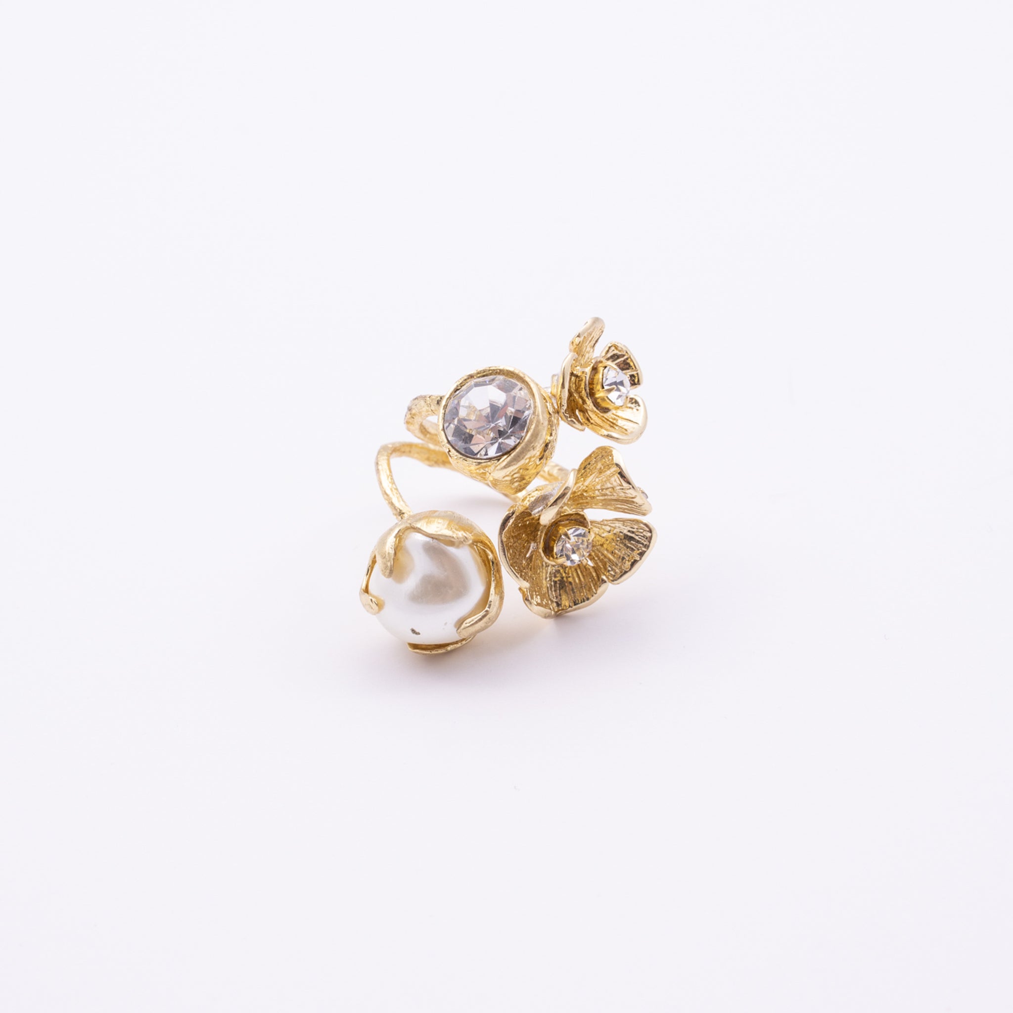 Double Posy Ring close-up — handmade brass ring with crystal stone set into ruffled petal center