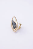 Side view of handmade gold crystal ring showing open adjustable-style back