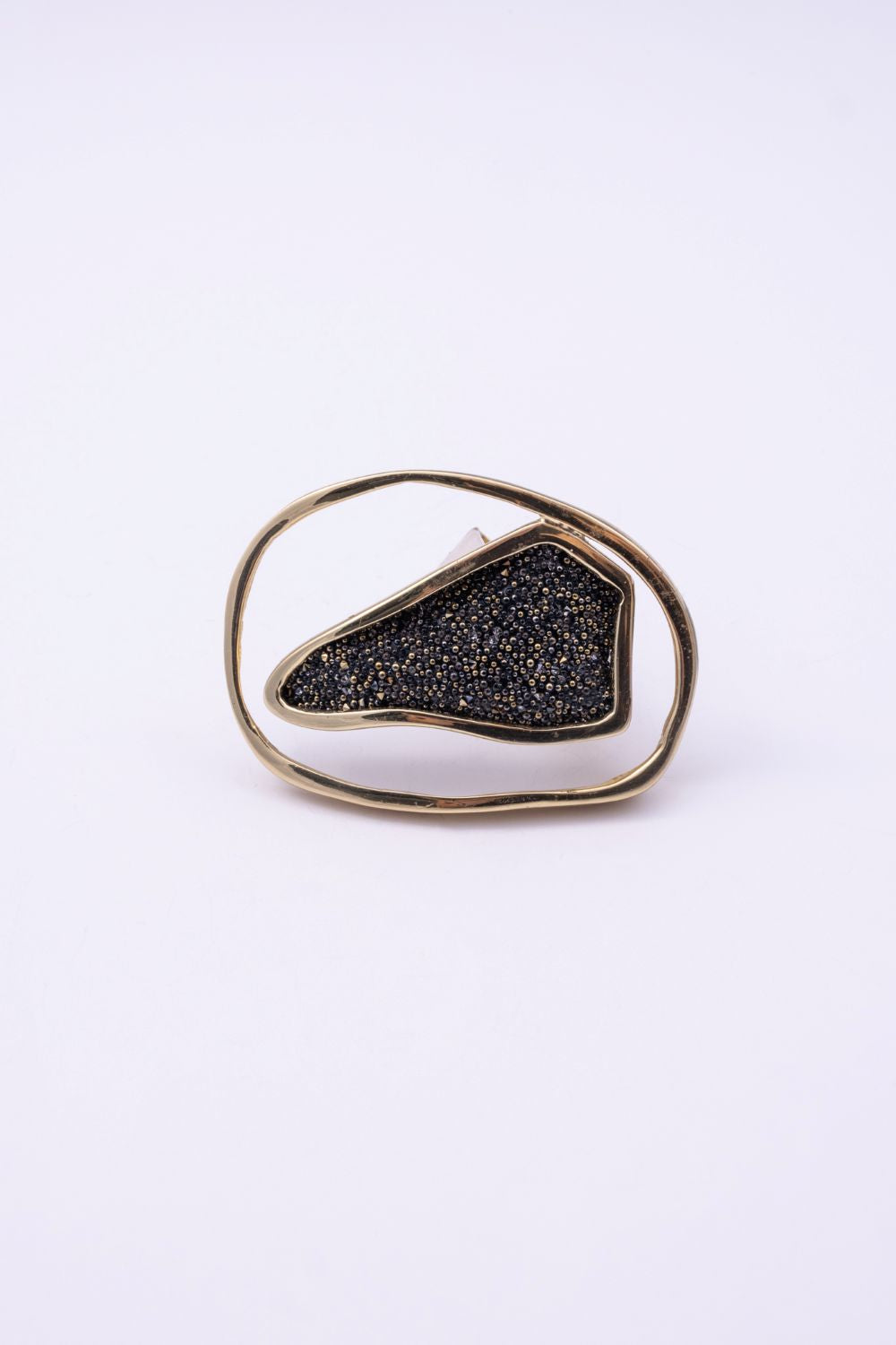 Gold oval statement ring with textured crystal surface, handmade in Greece