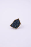 Front view of handmade gold geometric ring with compressed crystal surface