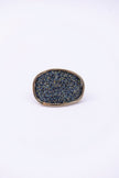Front view of oval crystal ring with slim gold frame, handmade in Greece