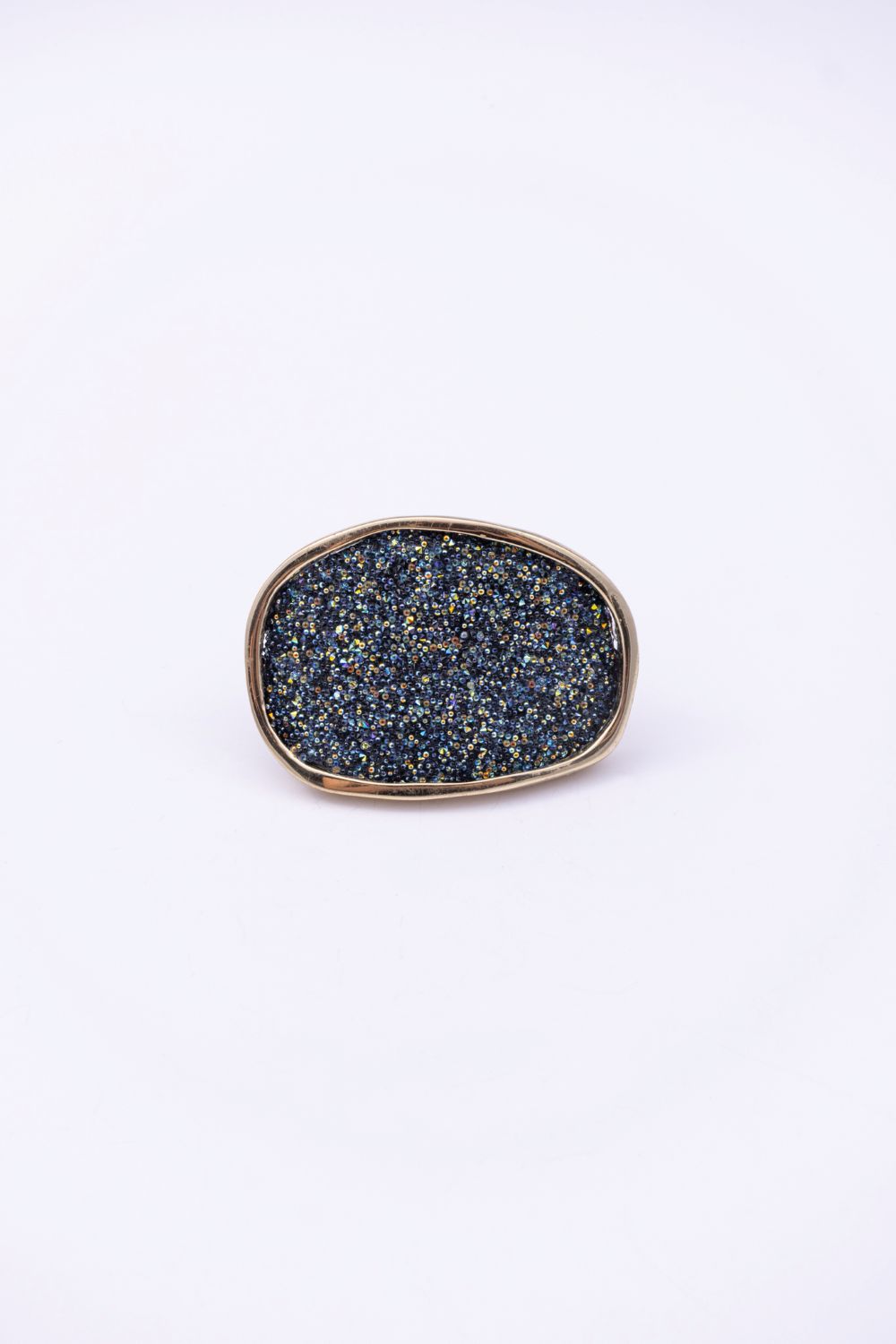 Front view of oval crystal ring with slim gold frame, handmade in Greece