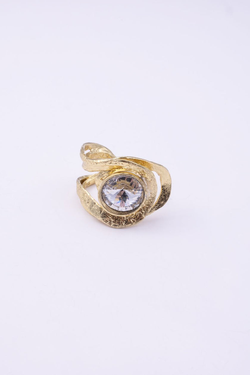Shiny Boteh handmade gold-plated paisley statement ring with clear crystal and textured bands on a white background