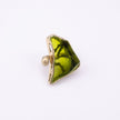 Kate gold-plated brass cocktail ring with a large olive green resin stone in a sculptural gold frame, front view on white background