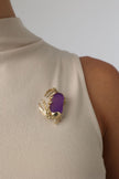 Crabby Pin close-up — handmade brass sculptural crab brooch with textured shell and resin detail