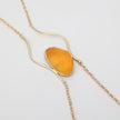 Elemental Pebble Necklace — handmade brass wavy link necklace, straight on white background