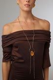 Elemental Pebble Necklace on model — handmade brass long necklace worn showing drape and length