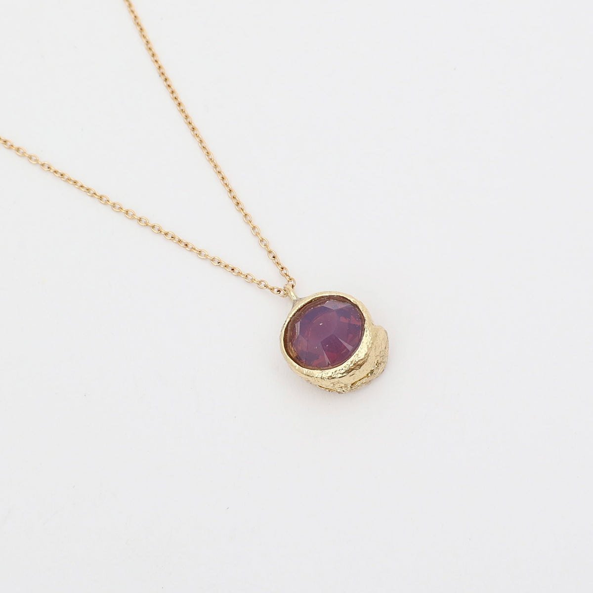 Billy Necklace — handmade brass pendant necklace with faceted gemstone, organic textured bezel