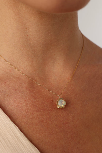 Billy Necklace — handmade brass crystal pendant necklace worn on model