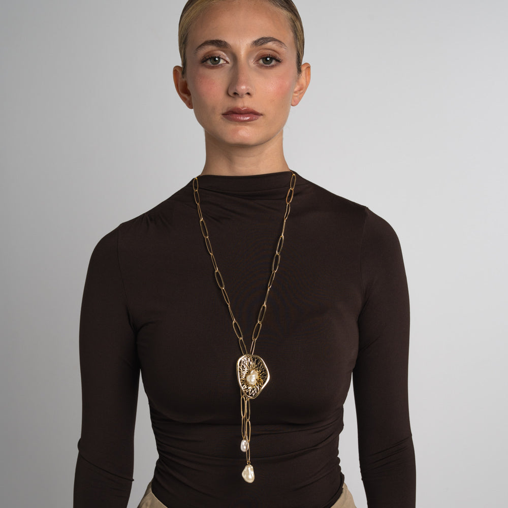 Handmade bronze necklace with amethyst crystal, creamrose detail and pearl accents by Kalliope Jewelry