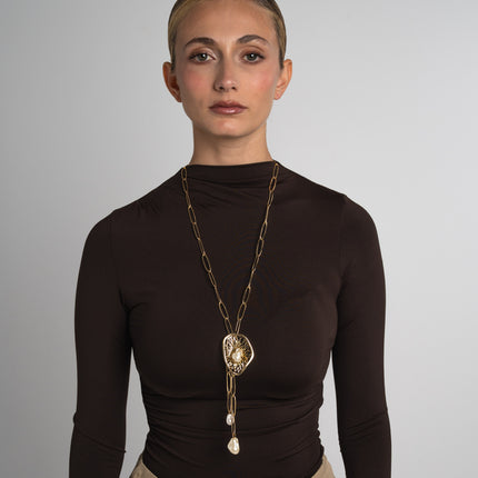 Handmade bronze necklace with amethyst crystal, creamrose detail and pearl accents by Kalliope Jewelry