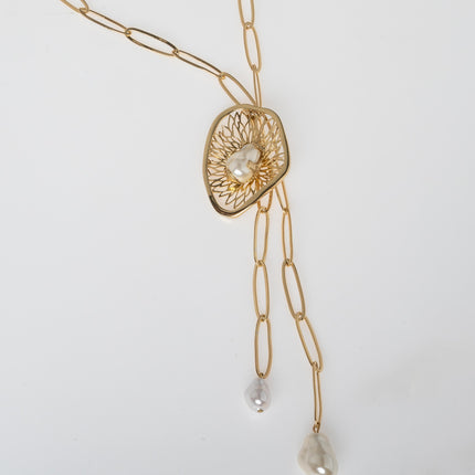 Handmade bronze necklace with amethyst crystal, creamrose detail and pearl accents by Kalliope Jewelry