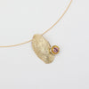 Limpet Necklace flat lay — minimal boho jewelry sea shell pendant necklace, artisan jewelry made in Greece