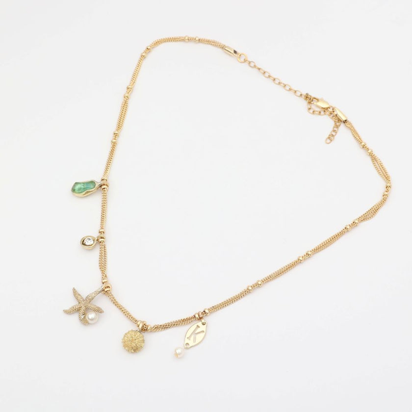 Charmy Tide Necklace — handmade jewelry multi-strand charm necklace flat lay
