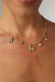 Charmy Tide Necklace — handmade brass jewelry sea charm necklace on model