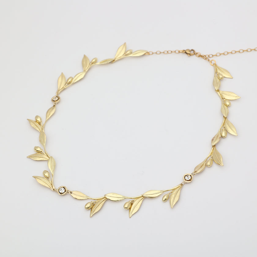 handmade brass nature-inspired statement necklace from the Olive Tales collection