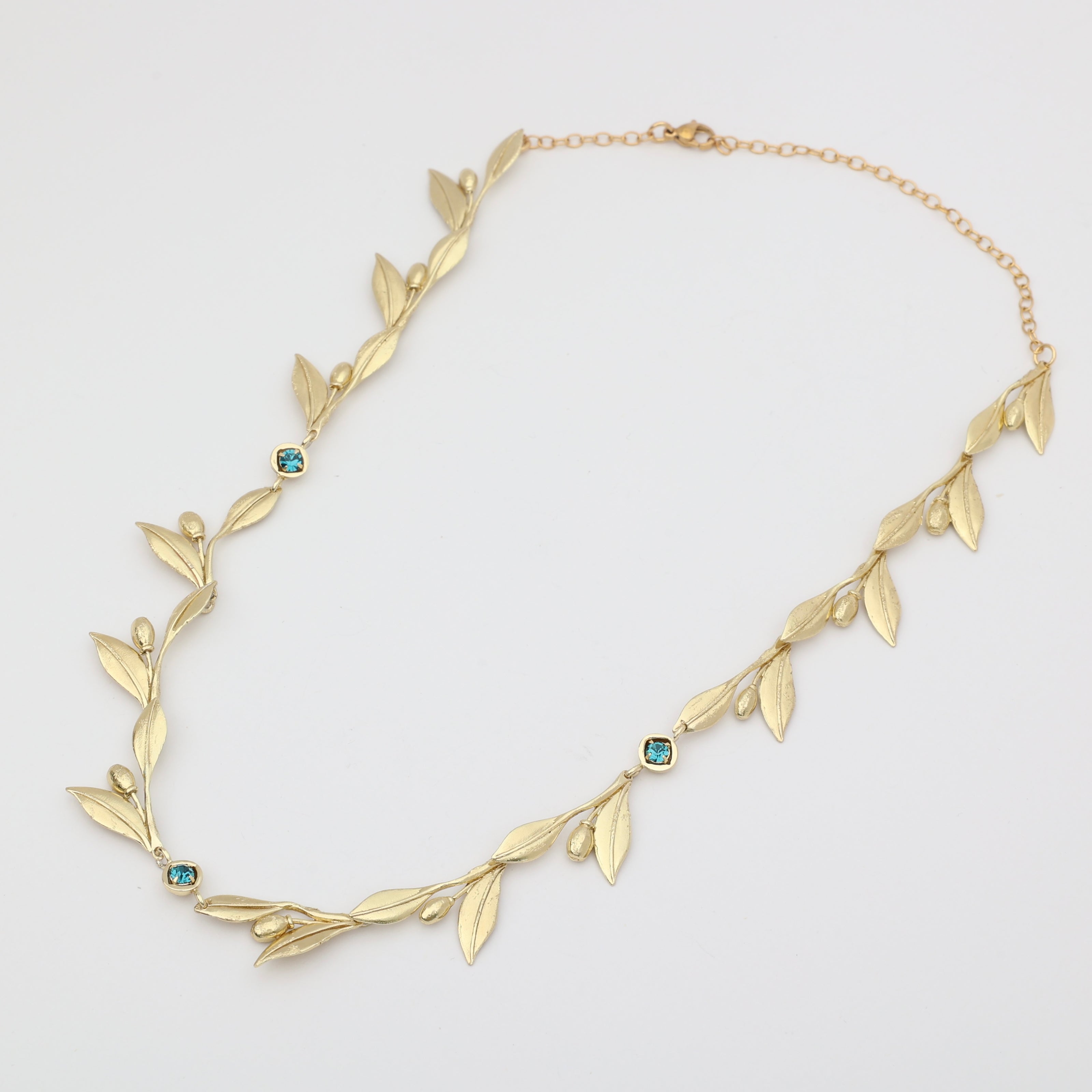 handmade brass sculptural necklace with crystal accents, artisan jewelry made in Greece