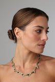 Selia Necklace close-up — handmade brass botanical necklace from the Olive Tales collection, artisan jewelry made in Greece