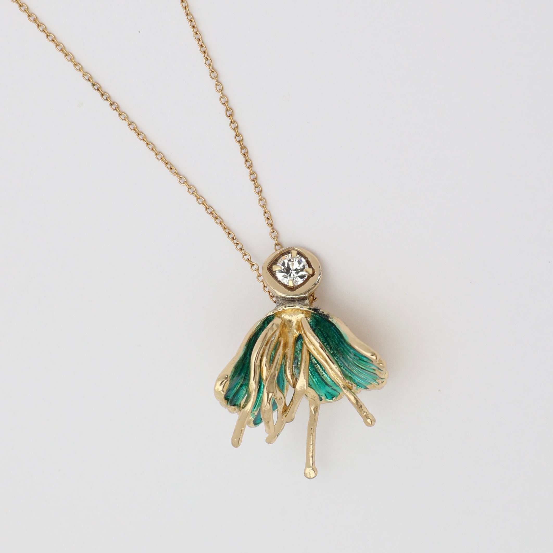 Iria Necklace — handmade brass and green enamel pendant necklace with crystal stone