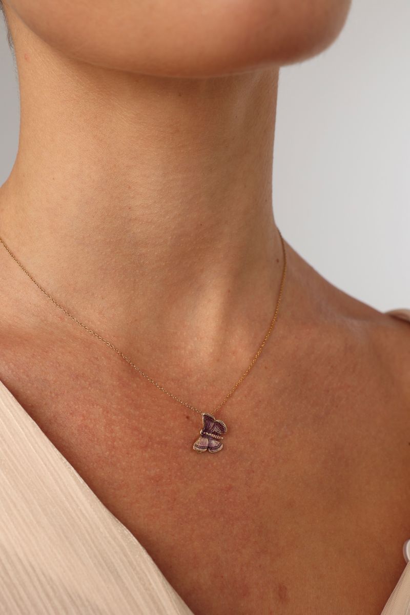 Fiora Necklace on model — dainty brass butterfly necklace with hand-applied enamel