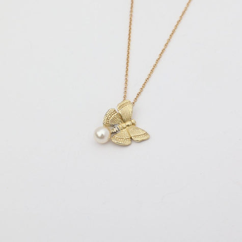 Elys Necklace — handmade brass butterfly necklace with freshwater pearl pendant, made in Greece