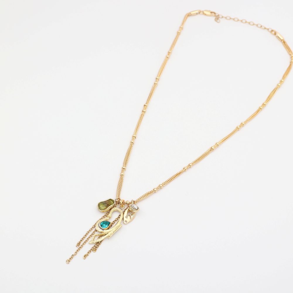 Gold necklace with a pendant on a white background