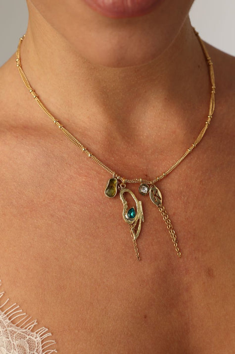 Liora Necklace — handmade brass sculptural charm necklace with gemstone drops, made in Greece