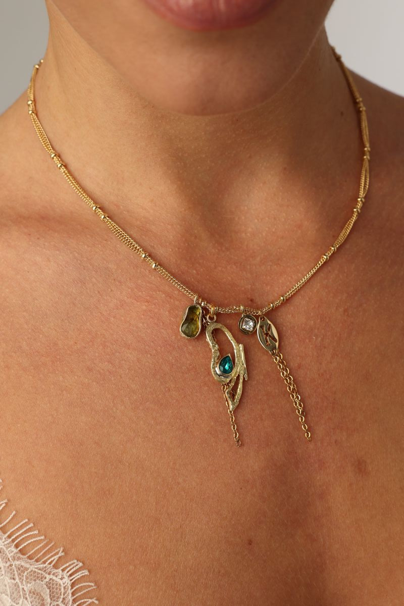 Liora Necklace — handmade brass sculptural charm necklace with gemstone drops, made in Greece