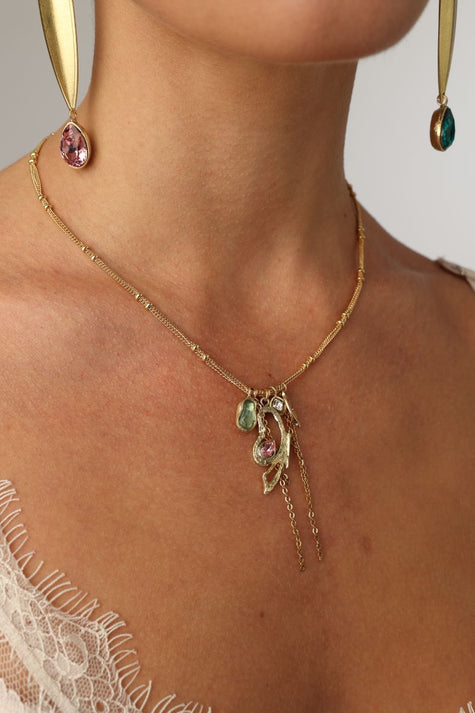 Liora Necklace — handmade brass multi-charm gemstone necklace with satellite chain, worn on model