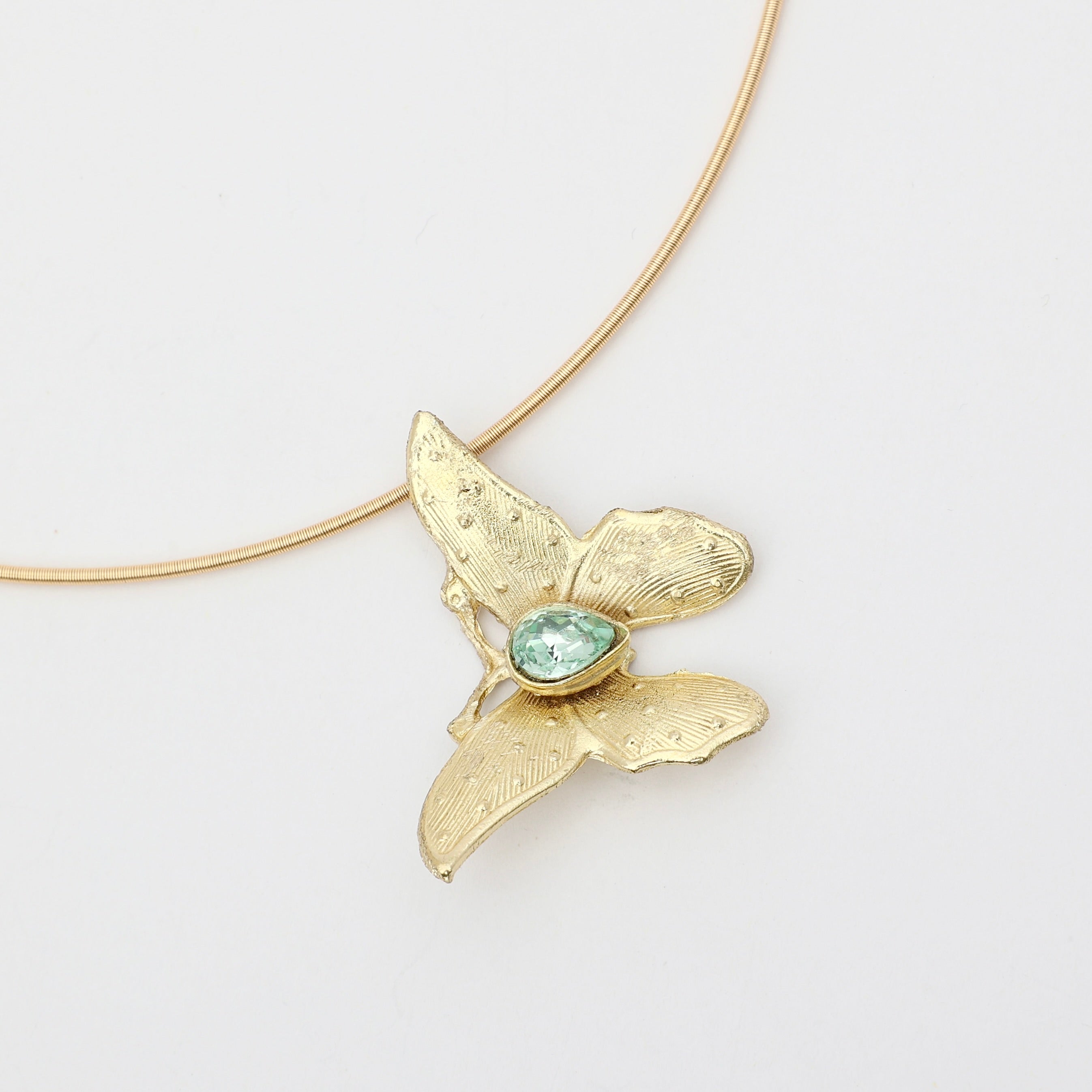 Nymia Necklace — handmade brass butterfly pendant necklace with blue teardrop gemstone