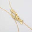 Dragonfish Necklace — handmade brass lariat necklace with raw sculptural pendant verdigris patina, flat lay