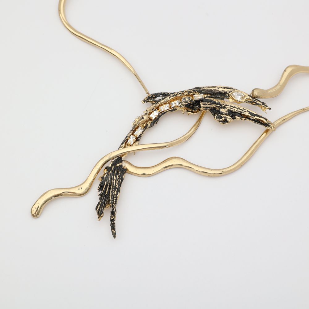 Dragon Necklace — handmade brass wave collar necklace with oxidized sculptural creature and crystal detail, artisan jewelry made in Greece